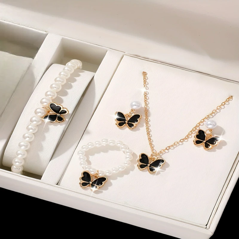 Butterfly pearl necklace earring bracelet & ring