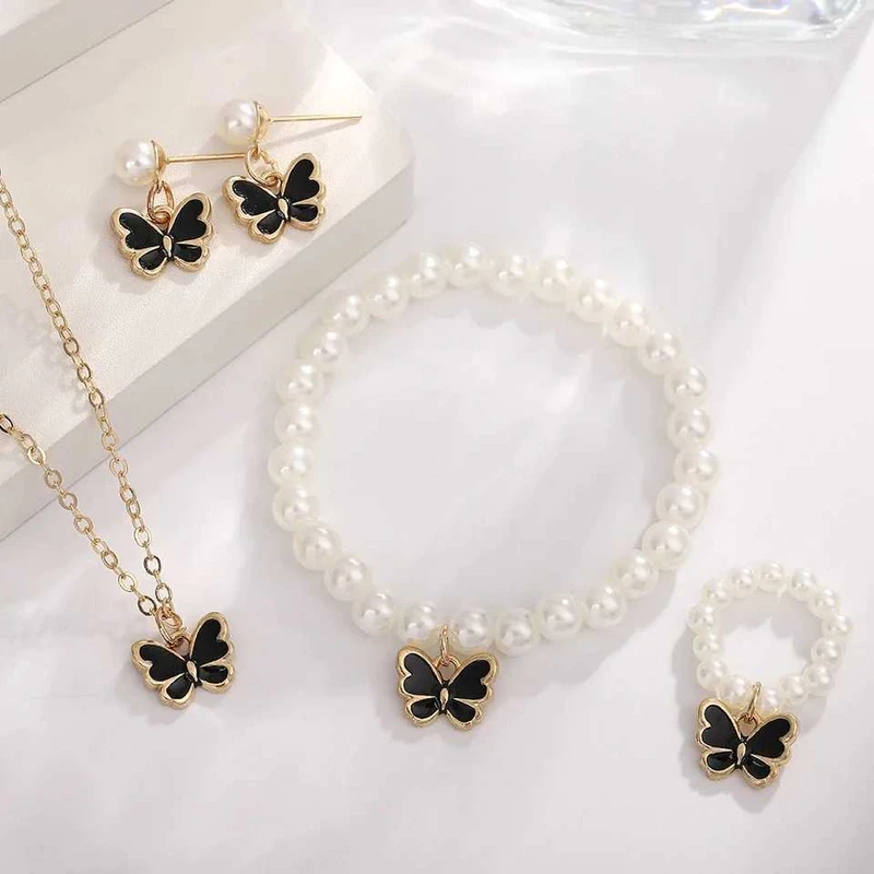 Butterfly pearl necklace earring bracelet & ring