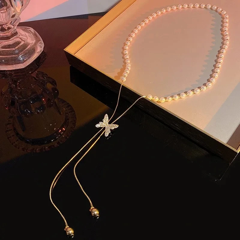 Butterfly pearl necklace